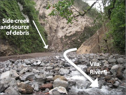 Looking up Vila River at debris field coming from creek on left.